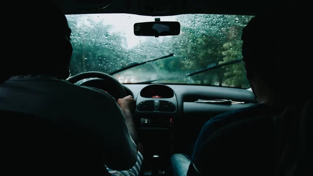 Car Wiper Blades Going On Rainy Day